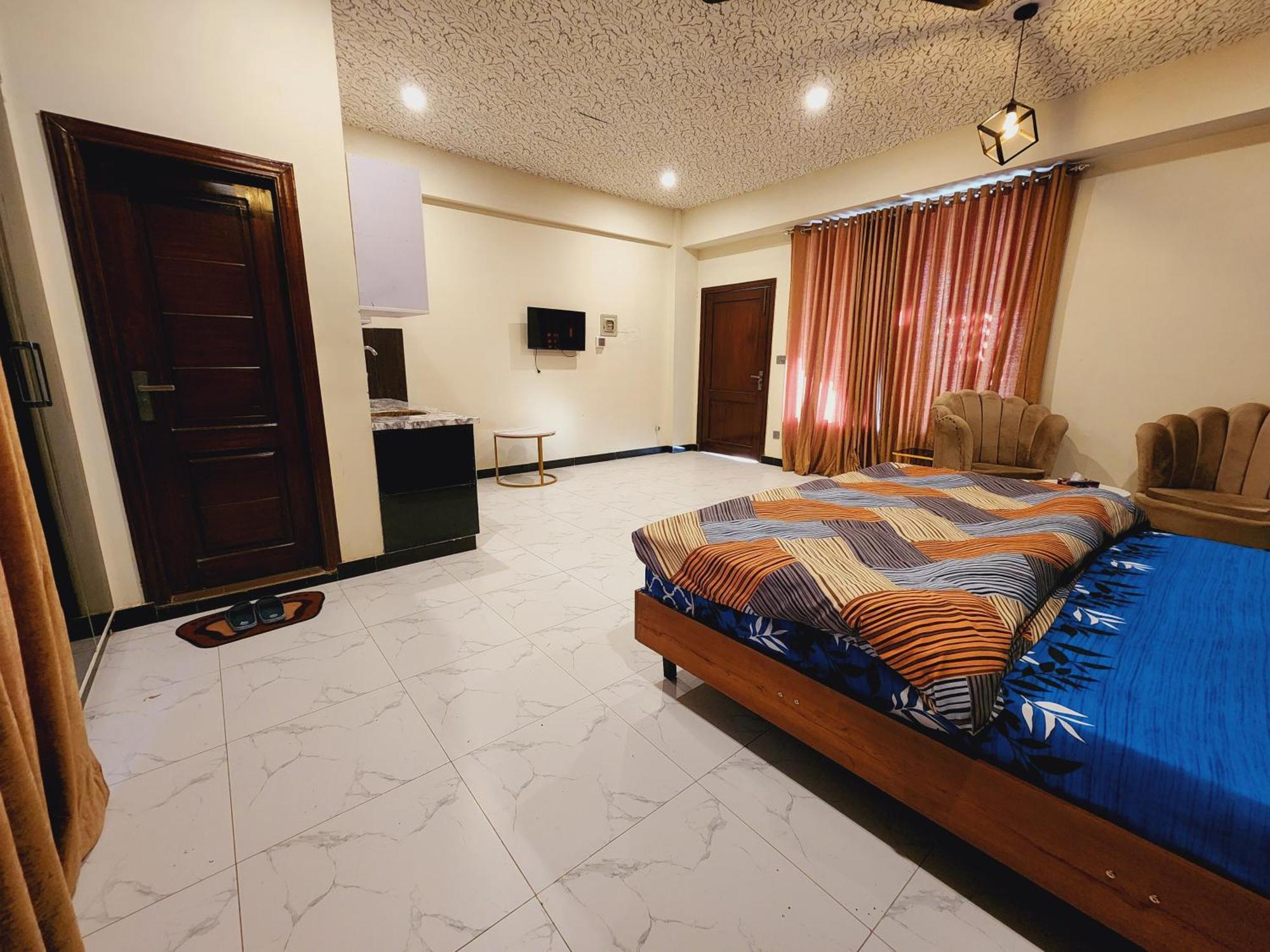 Motorway Majesty Suites Islamabad - Near Islamabad International Airport And Motorway Номер фото