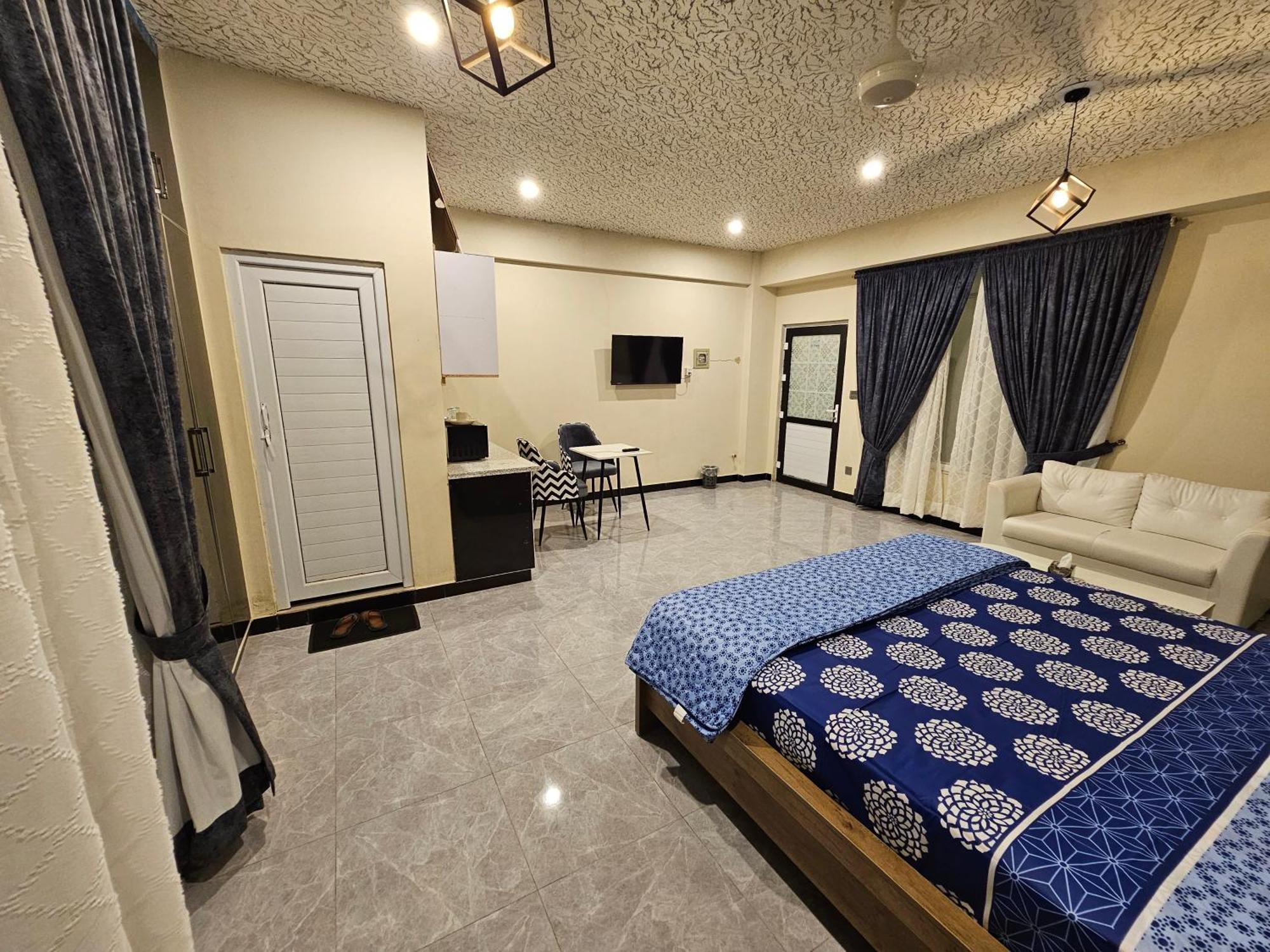 Motorway Majesty Suites Islamabad - Near Islamabad International Airport And Motorway Номер фото